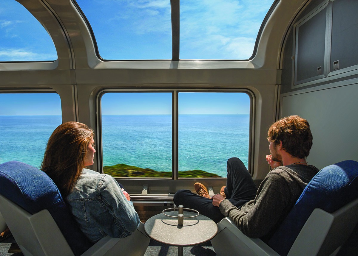 Couple Sits in Coast Starlight Observation Car