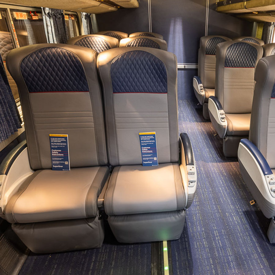 Amtrak coach seats in daylight.