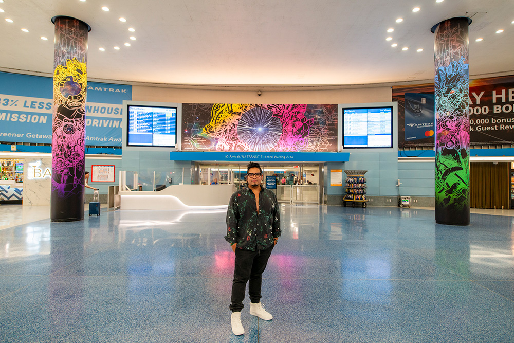 Artist David Rios Ferreira at Penn Station