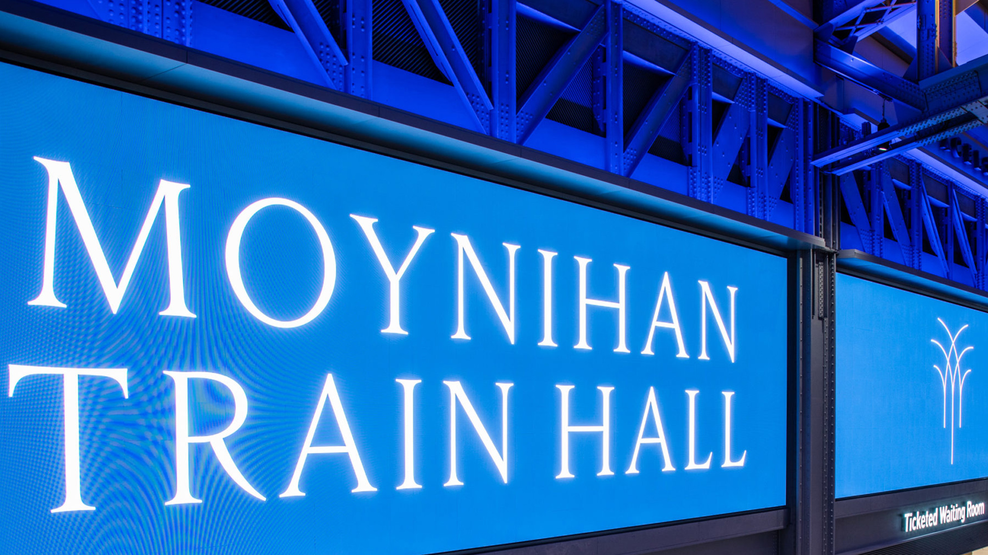 https://www.amtrak.com/content/dam/projects/dotcom/english/public/images/content/future-of-rail/moynihan-train-hall-digital-sign.jpg/_jcr_content/renditions/original