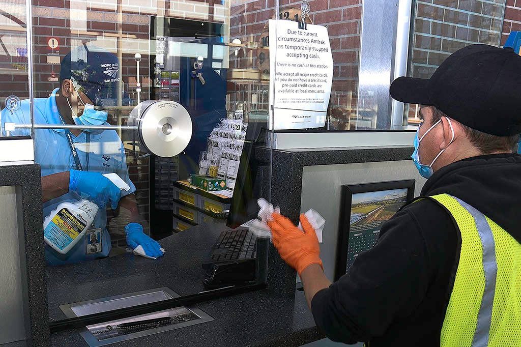 Ticket office window being cleaned.