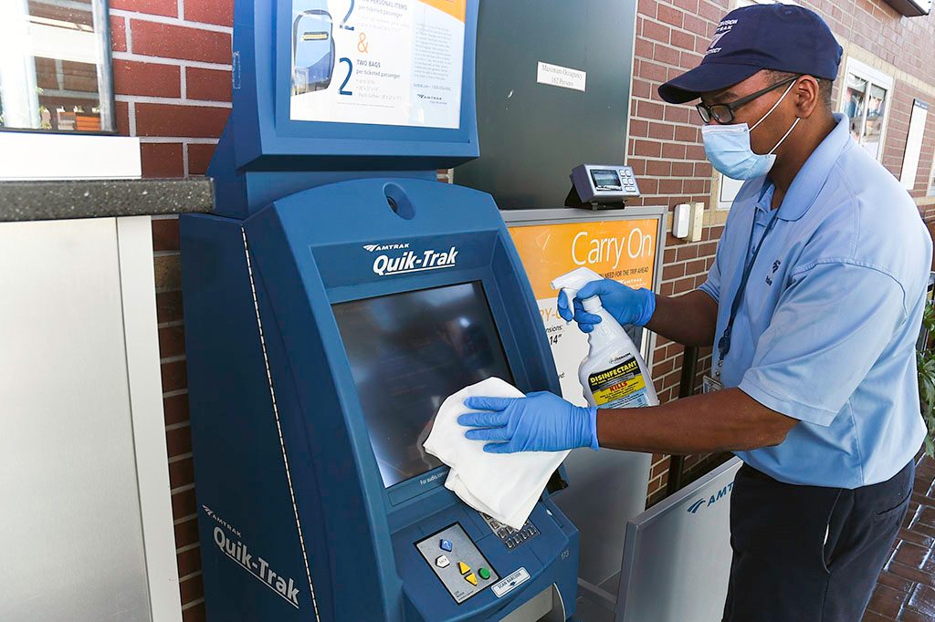 Quik-Trak kiosk in station being cleaned.