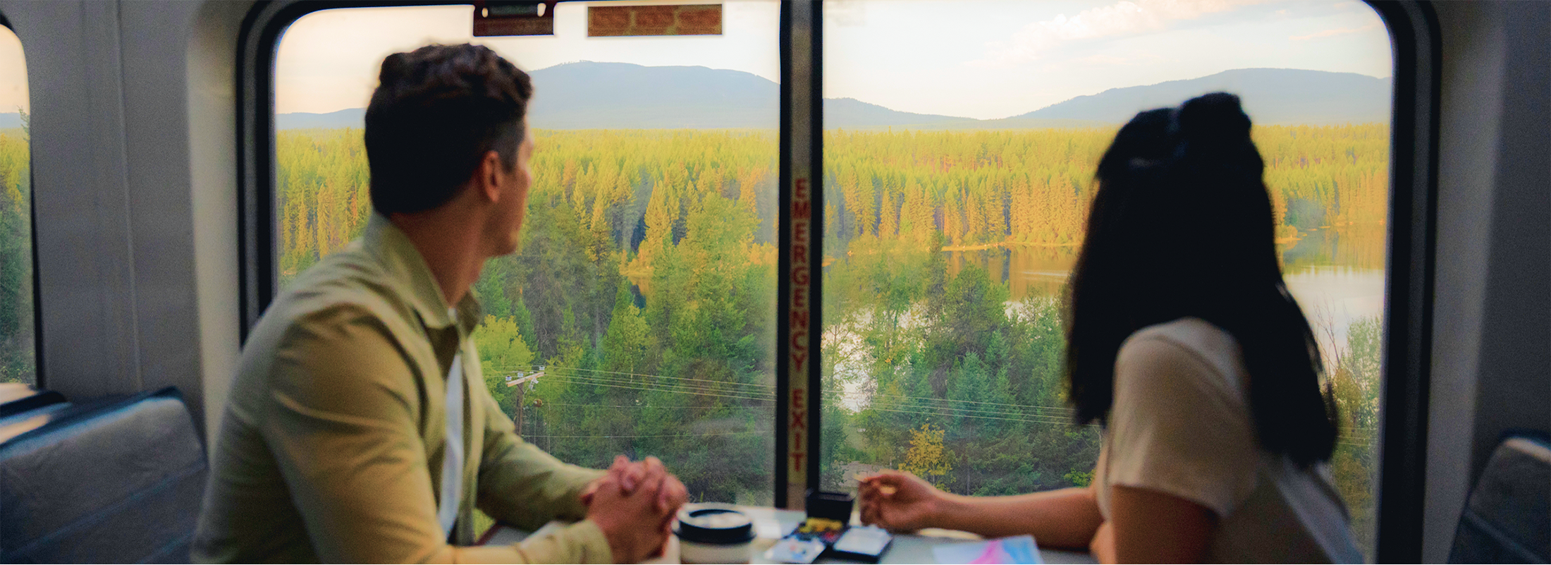 couple-looking-out-the-window-on-amtrak