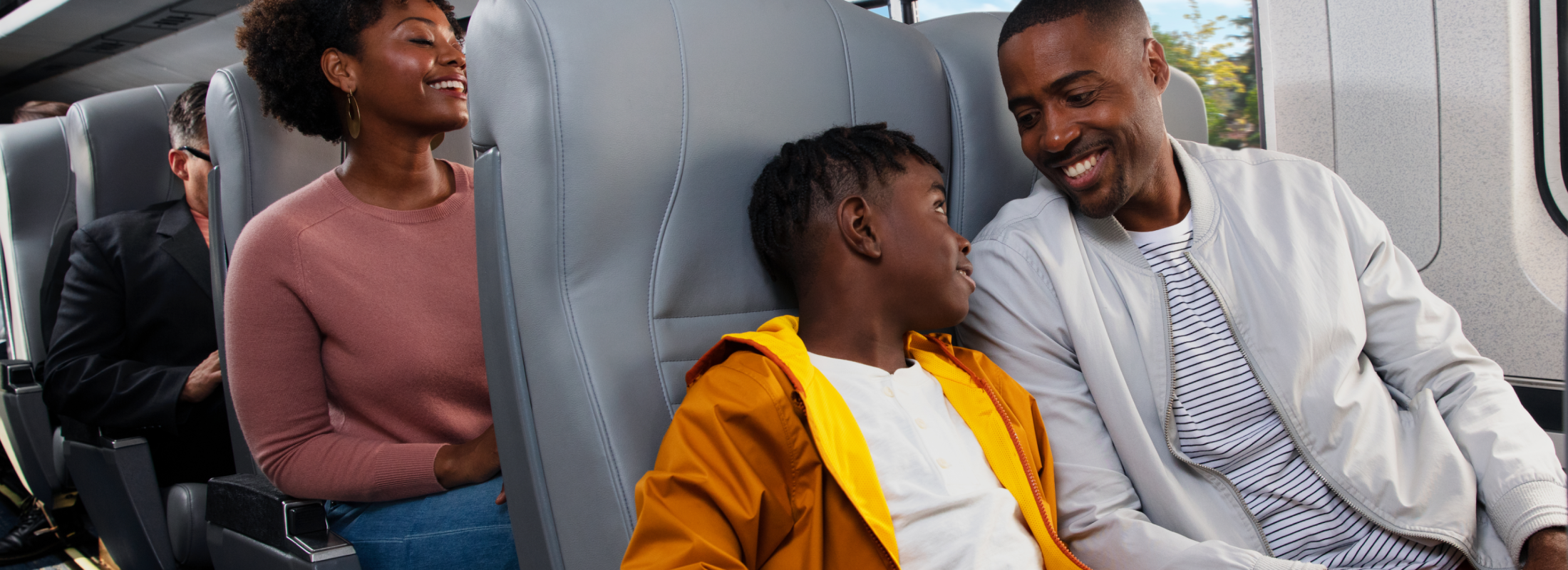 family-riding-with-smiles-on-amtrak