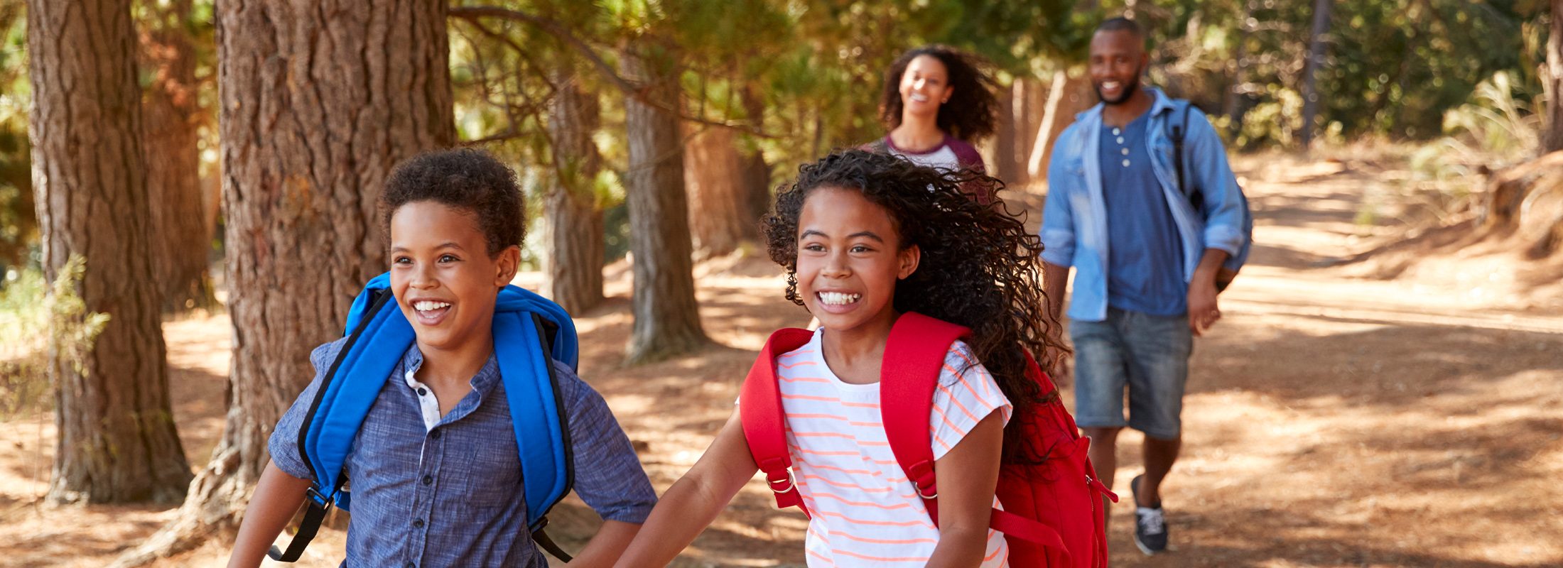 kids running with parents right behind them