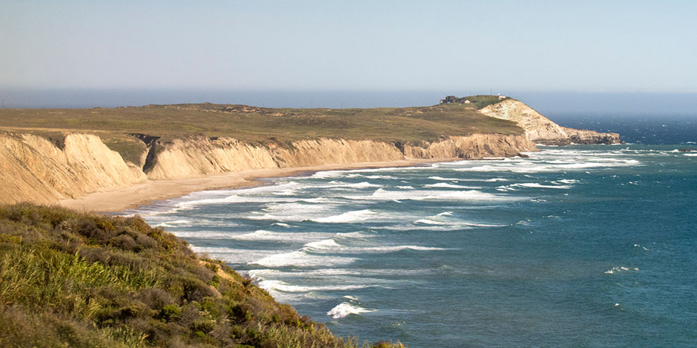 Coast Starlight views of coastal peninsula beach