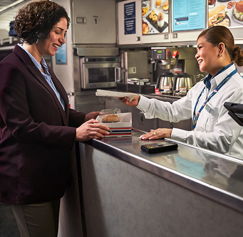 businesswoman-buying-food-in-cafe-car